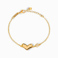 Glozya 18K Gold Plated Geometric Heart Bracelet featuring a bold geometric heart design with an adjustable chain.