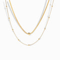 18K Gold Plated Layered Chain Necklace with snake and beaded chain details.