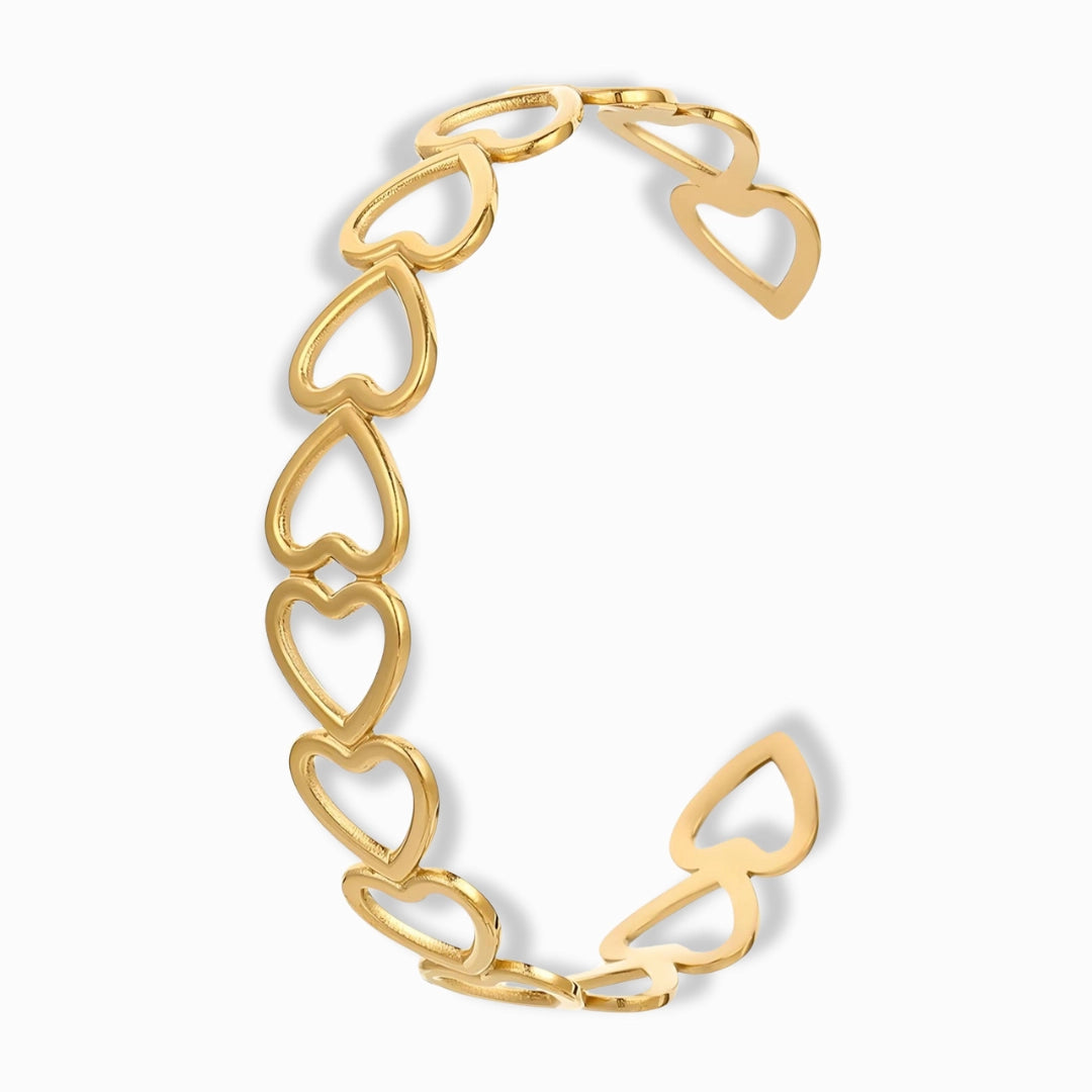 Glozya 18K Gold Plated Open Heart Cuff Bracelet featuring a bold open-heart design in a gold finish.