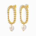 Glozya 18K Gold Plated Pearl Drop Hoop Earrings with delicate gold beaded hoops and a suspended pearl, crafted from waterproof, hypoallergenic stainless steel.