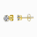 Glozya 18K Gold Plated Round CZ Stud Earrings featuring a sparkling cubic zirconia stone set in stainless steel with triple-layer 18K gold plating, hypoallergenic and waterproof.