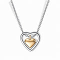Glozya Two Tone Heart Necklace — studio product photo on white background